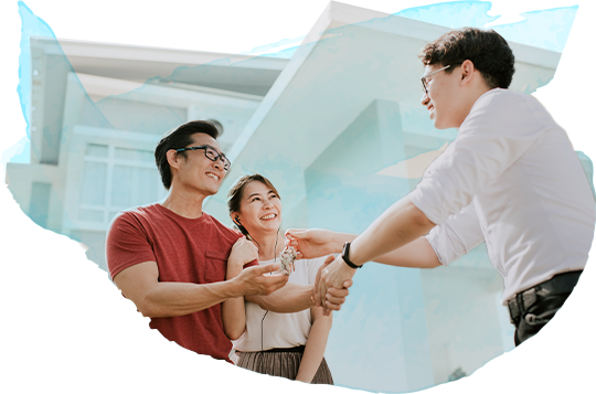 couple receiving keys to home