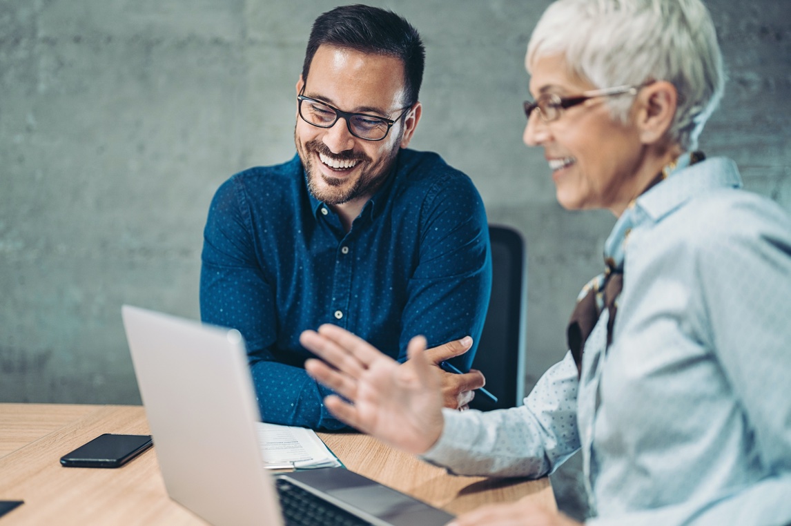 Man and woman banking on computer